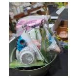 Bucket of garden figurines
