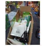 Box lot of garden figurines and tools