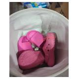 Basket full of kids flip flops