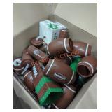 Box lot of football cups and items