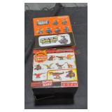 Toy monster trucks and toy dinosaurs