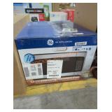 GE 1.1 cu ft countertop microwave oven