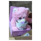 Two stuffed bears with mugs