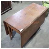 45"L x 57.5"W x 30"H Drop-Leaf Table