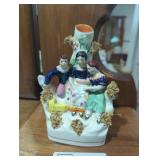 Staffordshire children reading spill vase