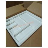 White plastic cabinet with drawers