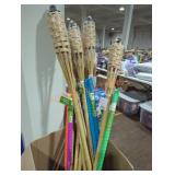 Box of bamboo torches and citronella yard candles Box of bamboo torches and citronella yard candles