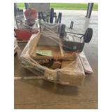 Flooring,rug, wooden shutters, wheel barrel
