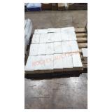 21 boxes of white tiles