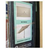 Hampton Bay 10 ftx 6.5 ft auto tilt umbrella