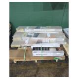 Skid full of miscellaneous flooring boxes
