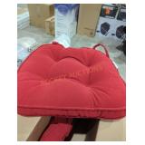 2 red chair cushions