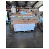 Unopened boxes, artificial Christmas tree