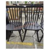 2 black dining chairs