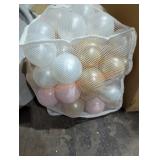 Plastic brown, pearl, and gold balls