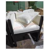 White chair with pillow