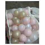 Plastic brown, pearl, and gold balls