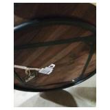 Round wooden table with metal legs