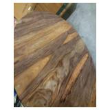 Round wooden table with metal legs