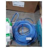 coil of blue PVC electrical wire