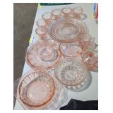 Collection of pink depression glass.