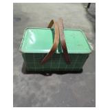 Vintage metal lunch box with wooden handles.