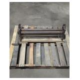 antique manual sheet metal slip roller.