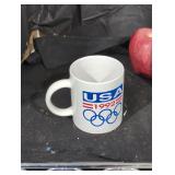 Pair of 1992 Olympic mugs.