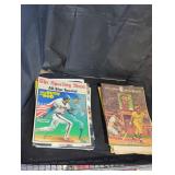 Vintage baseball magazines and sports newspapers.