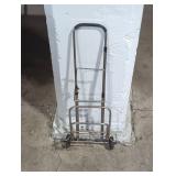 compact, chrome-plated folding luggage cart.