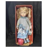 Red shed collectible doll Hailey.