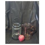 Yankee glass lantern and pink glass pitcher.
