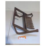 antique cast iron fireplace insert grate.