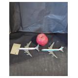 2 die cast model airplanes.