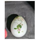 Hand blown and painted glass egg.