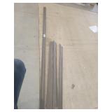 Assorted size brown wood molding
