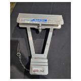 Quick click ladder stabilizer
