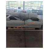 White sofa with back damage