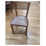 Brown metal dinning room chair.