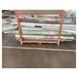 Assorted Pipes, Rolls of Carpet, Rugs, Turf