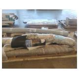 Assorted rugs, roofing felt