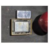 2 Zippo Lighters  with one Display Case