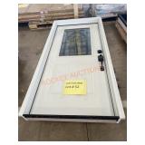 36in Entry Door RH Inswing (damaged), Located in