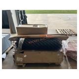 Wire fencing, water dispenser, unopened boxes