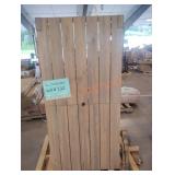 Outdoor wooden table with chairs and cushions