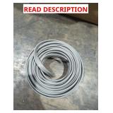 coiled spool of gray electrical or control cable