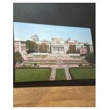 A framed Manhattan print and blown up picture of