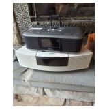 Pair of speakers one Bose one iHome.