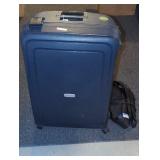 Large Blue Wheeled Suitcase with Carry Bag.