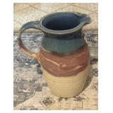 Ceramic hand made pitcher.